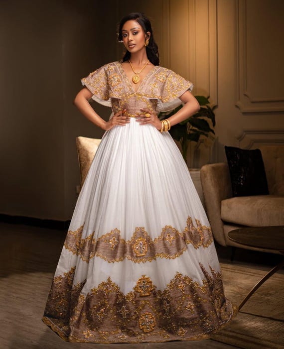 Elegant Habesha Wedding Dress - Handcrafted Ethiopian Bridal Kemis with Gold Tilf Elegant Habesha Wedding Dress - Handcrafted Ethiopian Bridal Kemis with Gold Tilf