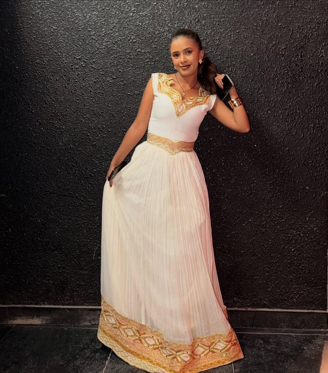 Ethiopian Traditional Dress – Elegant Gold Kemis for Holidays