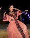 Modern Ethiopian Dress with Red Trim – Chic Habesha Kemis | Habesha libs product logo