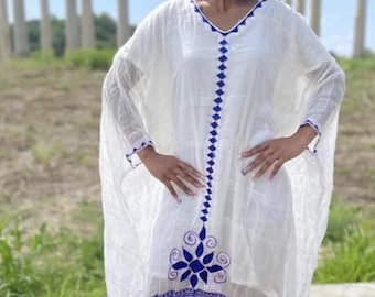 Elegant Blue Ethiopian Coffee Dress – Stylish Habesha Traditional Dress