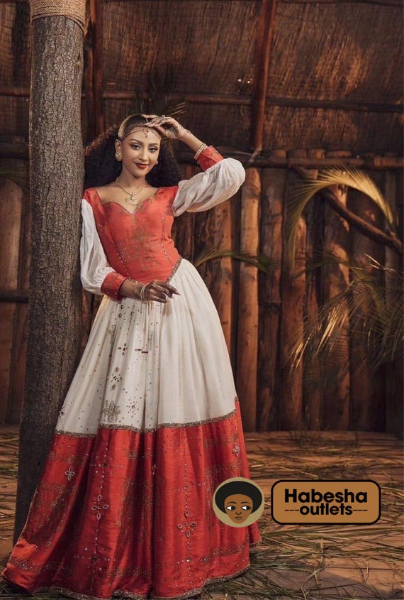 green emerald velvet dress Pink Based Multicolored Eritrean Clothing: with Cross Adornments Ethio   TheEthiopianStore