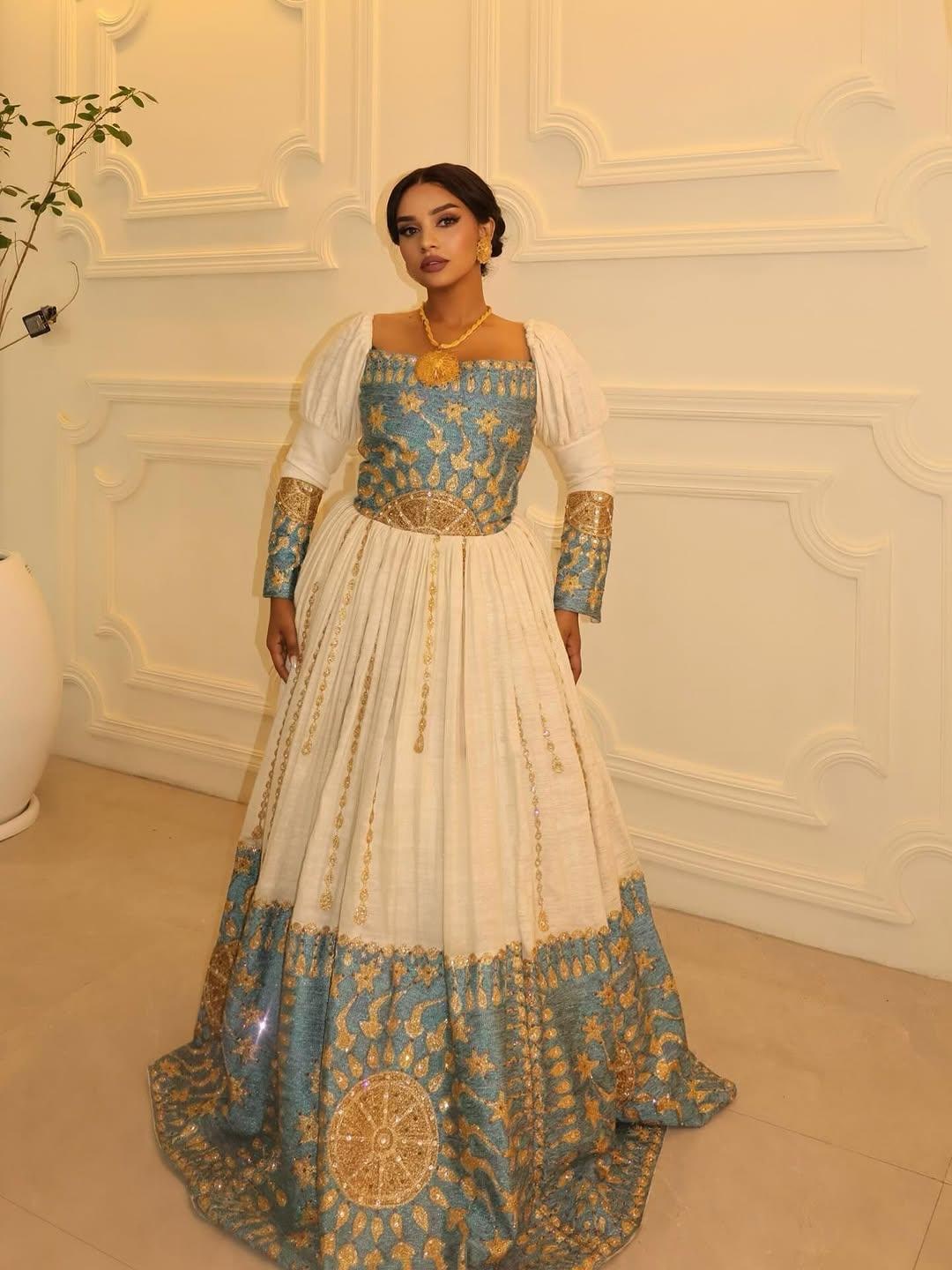 Blue Habesha Kemis: Handmade Ethiopian Wedding Dress with Gold Embroidery