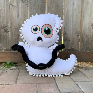 plush ghost halloween plush pillow. halloween decoration spooky ghost plush with pompom fringe trim & plush chains & funny ghost face