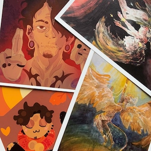 May include: A collection of art prints featuring illustrations with various themes. One print depicts a person with tattoos and piercings, making a hand gesture. Other prints showcase figures with wings and abstract art.