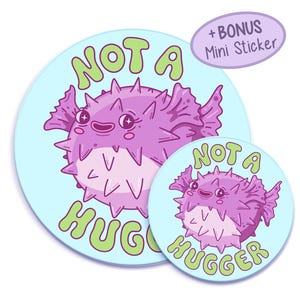 A cute and spiky purple puffer fish with the text "Not a Hugger" in bubbly green letters on a light blue background.