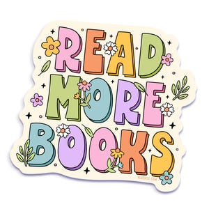 May include: A colorful sticker with the words "READ MORE BOOKS" in large, bubble letters. The letters are in shades of pink, orange, yellow, green, blue, and purple, with floral accents and a cream-colored background.