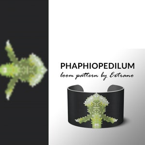 May include: A black loom bracelet with a green and white pattern of a flower. The bracelet is labeled "PHAPHIOPEDILUM loom pattern by Extranoo".