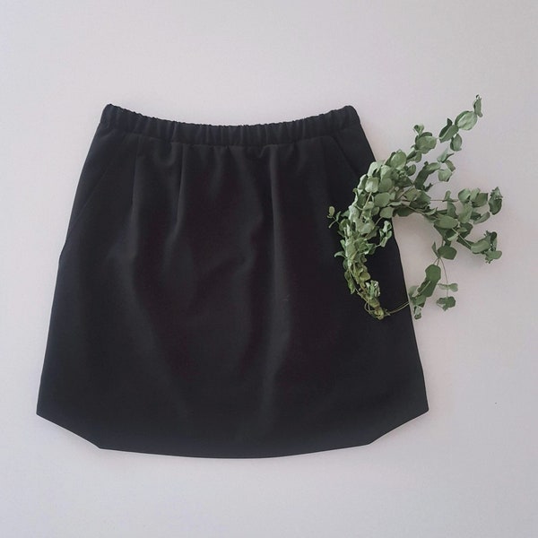 Mini jupe classique droite taille élastique marine ou noire pour femmes avec poches. Taille haute régulière. Doublée. Sur commande