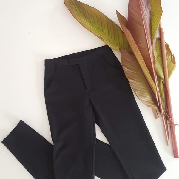 Women's classic straight pants black suiting or canvas. Side and back pockets. Adjusted leg. Office pants. Regular waistband. Stretch