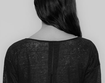 Linen sheer sweater for women.  Black fine knit. Long sleeves. Low armholes. Back detail. Back pleat. Round neckline. Restock on pre-sale