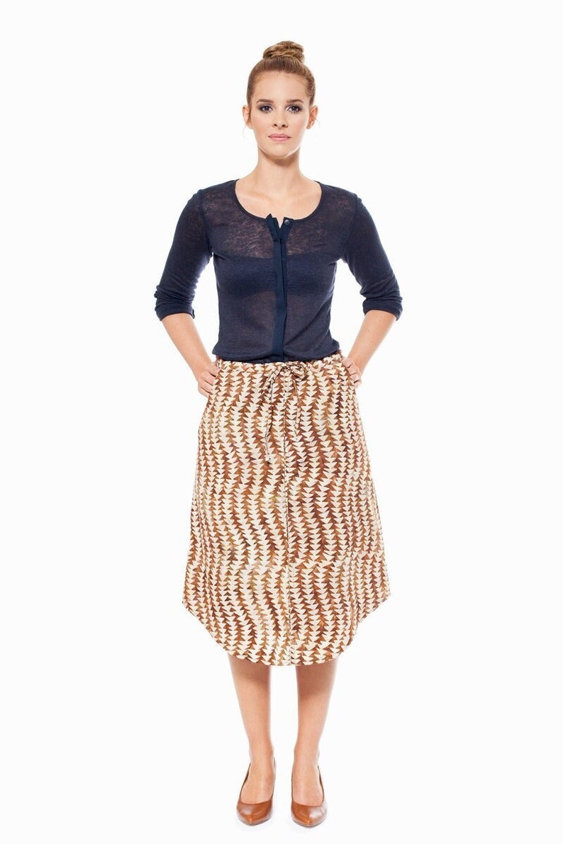 PROMO : Drawstring midi skirt rust printed cotton for woman. Side pockets. Front detail. Zip. Unlined. Summer. Triangle pattern. image 1