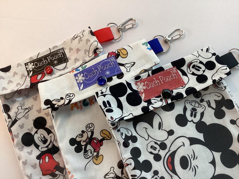 May include: A set of three ceramic mugs with a speckled, matte finish. The mugs are in shades of cream, light gray, and dark gray. Each mug has a simple, minimalist design, perfect for coffee or tea.