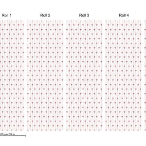 May include: Wallpaper rolls with a repeating pattern of small, pink triangles on a white background. Each roll is 39 inches wide and 118 inches tall. The image shows five rolls of wallpaper.