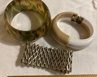 Three vintage cuff bracelets, a retro bracelet wardrobe