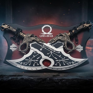 May include: A pair of silver and black blades with intricate designs, mounted on a wooden plaque. The blades feature ornate handles with skull-like details. The plaque has the "God of War" logo and a red and black color scheme.