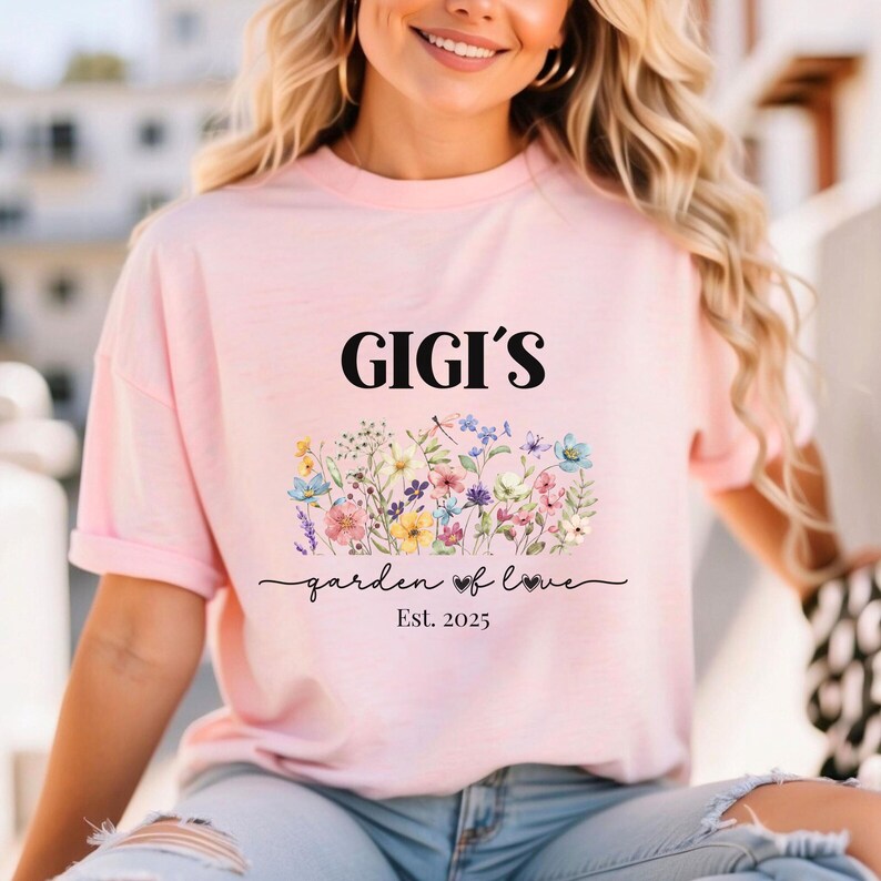 Model wearing blossom grandma shirt with delicate floral garden artwork – meaningful personalized gift for Gigi.