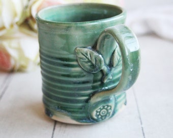 Ceramic Coffee Cup in Shimmering Green Glaze and Floral Details, Handmade Pottery Mug 12 oz. Ready to Ship Made in the USA