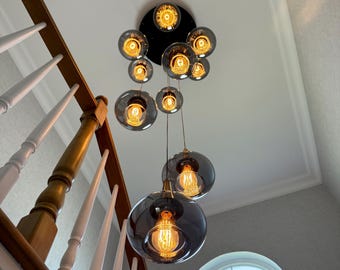 Hand Blown Glass Pendant Light: Elegant Bedside Lamp