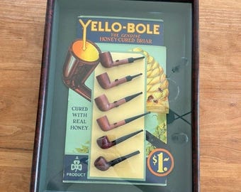 Expositor de pipas de brezo curado con miel Yello-Bole, modelo vintage de 1932, con 6 pipas.