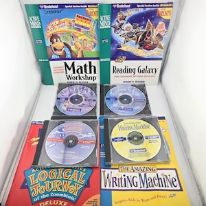 May include: A collection of four Broderbund Active Mind software titles including Math Workshop, Reading Galaxy, Logical Journey of the Zoombinis, and The Amazing Writing Machine, featuring their respective user guides and CD-ROM discs.