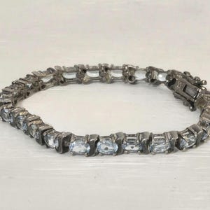 Vintage Sterling Silver Tennis Bracelet with Blue Topaz crystal links 7 inches