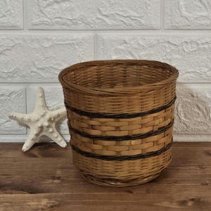 Vintage mid century handcrafted wicker plant basket. Wicker decor. Wicker pot.