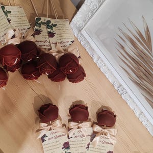 Roze plaatshouder/bonbonniere met stokje en opdracht/naam