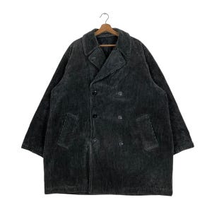 May include: A dark gray corduroy coat with a double-breasted design. The coat features a notched collar, two front pockets, and black buttons. The coat is hanging on a wooden hanger.