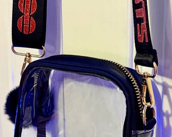 2026 Crossbody Bag for World Tour, 5.5x7x2, Clear Bag trimmed in black, thick crossbody strap with Vinyl Designs, roomy