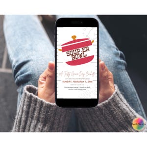 May include: A digital invitation on a smartphone screen for a "Soup-er Bowl" party. The invitation features a red pot with the text "Soup-er Bowl" in white. The invitation is for a game day cookoff on Sunday, February 9th at 5pm.