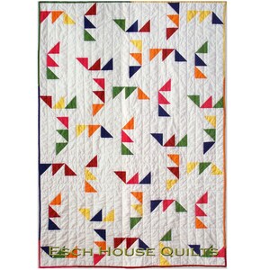 May include: A white quilt with a patchwork design featuring colorful triangles in shades of red, orange, yellow, green, and blue. The quilt is edged with a dark red border and has the text "ESCH HOUSE QUILTS" in green lettering at the bottom.