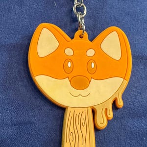 Pomarańczowy brelok z gumy Shiba Inu w kształcie lodów