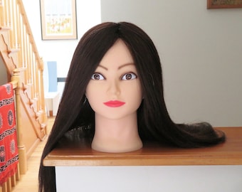 Vintage mannequin head, presentation head, beauty shop, long human hair, hair styling, hairdressing practice