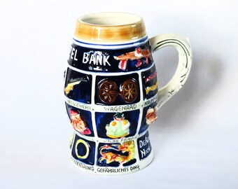 German beer stein, Schnitzelbank. vintage beer stein, collectible stein, man cave, beer mug, raised images, collectible breweriana, barware