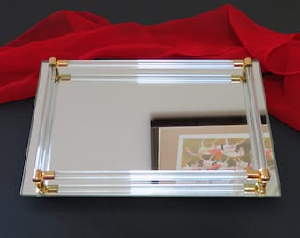 Vintage flat Vanity Mirror, rectangular 11" x 7.5", in original Avon box, unused, glass rails, gold tone metal, v. good condition, mirrors