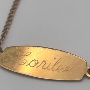 Vintage 60s 12K GF Lorilee Name Identity Bracelet 8.25 8 1/4 Inches 1/20 12K Yellow Gold Filled Love, Tom Cursive 7mm Tag Signed AJC Co
