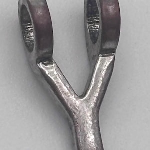 May include: A rustic wooden sign with the text "Welcome to our home" in white lettering. The sign features a distressed finish and a simple, inviting design, perfect for entryway decor.