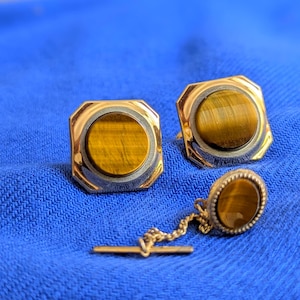 Conjunto de gemelos y alfiler de corbata vintage con ojo de tigre: joyería geométrica bicolor en oro y plata para hombre.