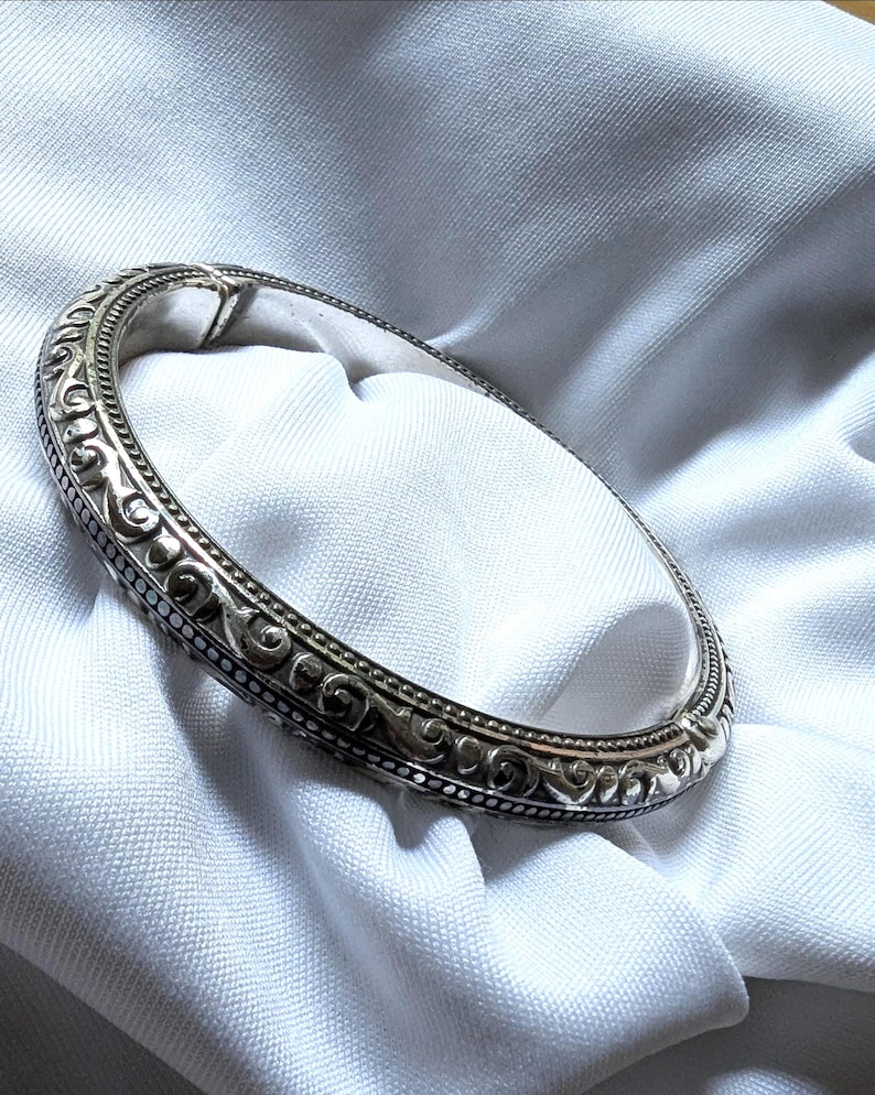 Vintage Brighton silver tone hinged bracelet with etched scroll design and beaded edges