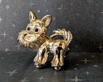 Broche vintage Gerry's Terrier : épinglette pour chien dorée des années 1960 avec des yeux écarquillés