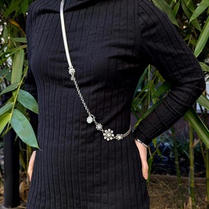 Vintage Brighton style silver-tone chain belt with flowers crystal station details and lobster clasp, XL length measuring up to 43 inches end to end.