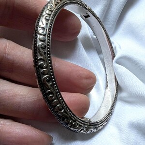 Vintage Brighton silver tone hinged bracelet with etched scroll design and beaded edges