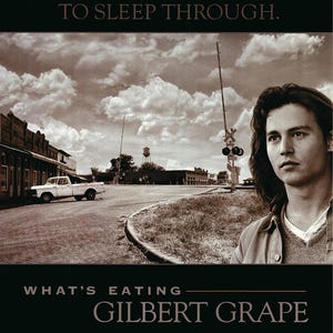 May include: A film poster for the movie "What's Eating Gilbert Grape", starring Johnny Depp and Juliette Lewis. The poster features a black and white image of Depp looking away from the camera, with a small town in the background. The text "Life is a terrible thing to sleep through." is at the top of the poster.
