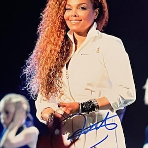 Janet Jackson original autographed photo - framed
