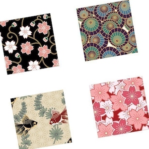 May include: Four different patterned squares featuring Japanese-inspired designs. The top left square has a black background with pink flowers and gold vines. The top right square has a blue and gold background with a pattern of overlapping circles. The bottom left square has a beige background with green leaves and gold fish. The bottom right square has a red background with pink flowers.