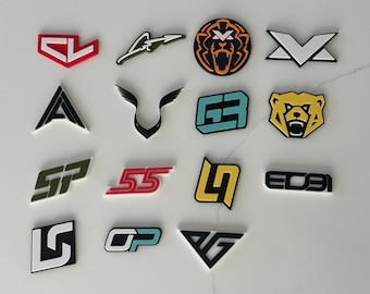 May include: A collection of various logo designs in different shapes and colors. The logos include geometric shapes, stylized letters, and animal illustrations. The color palette includes red, white, black, blue, yellow, and green.