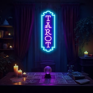 May include: A neon sign with the word "TAROT" in bright blue, hanging in a room with purple curtains and a table set for a reading. The table has tarot cards, a crystal ball, and candles.