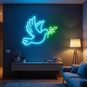 May include: A neon sign in the shape of a dove holding an olive branch, illuminated with blue and green lights. The sign is mounted on a dark blue wall in a living room setting. The dove is a symbol of peace.