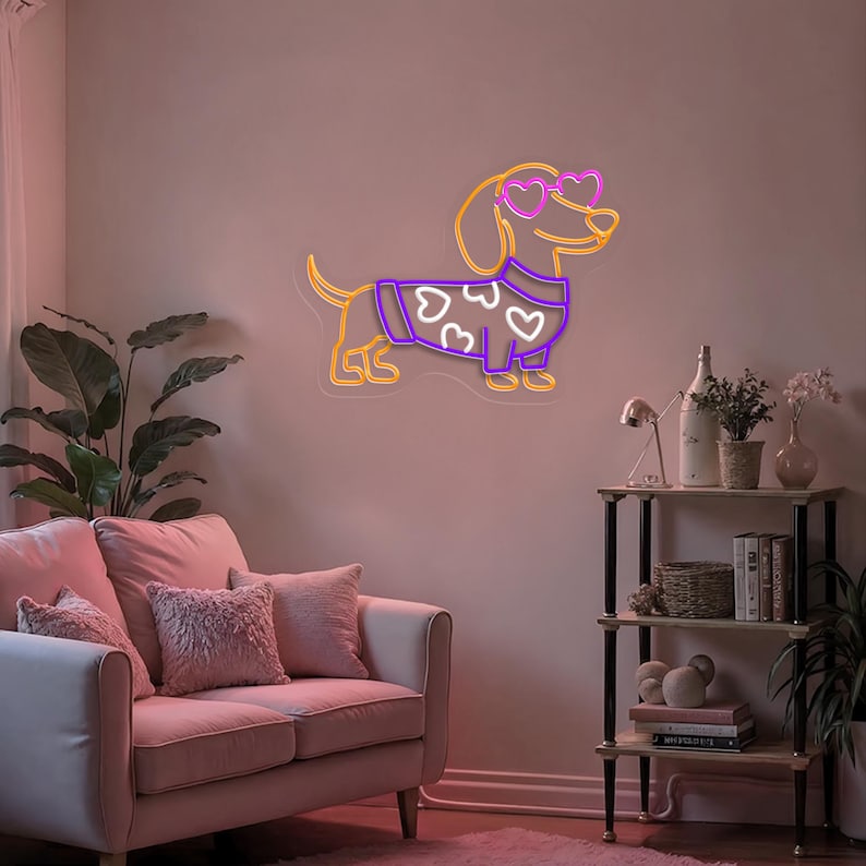 K&ouml;nnte beinhalten: Ein Neon-Schild mit einem Dackel, der eine Herz-Sonnenbrille und einen lila Pullover mit wei&szlig;en Herzen tr&auml;gt. Das Schild leuchtet in Orange und Lila.