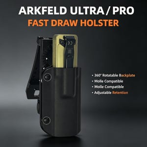 Könnte beinhalten: Ein schwarzes Arkfeld Ultra/Pro Fast Draw Holster mit einem goldfarbenen Gerät mit schwarzem Clip. Das Holster verfügt über eine um 360 Grad drehbare Rückenplatte, ist MOLLE-kompatibel und hat eine einstellbare Haltekraft. Text wie abgebildet.